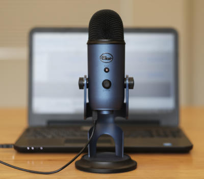 image of laptop and microphone