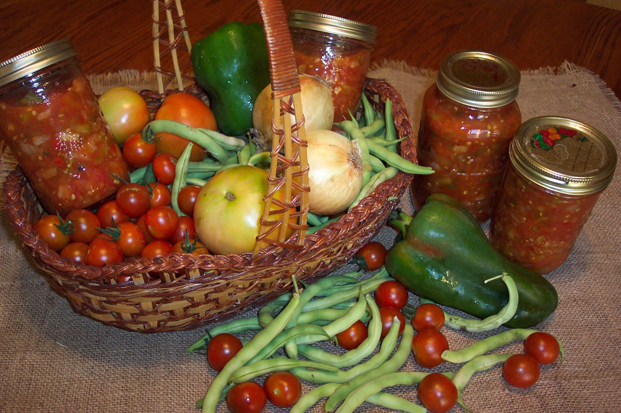 Basket of vegetables and canning jars