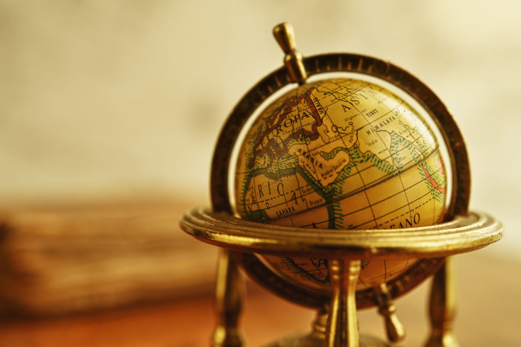 Vintage Globe and Old World Map